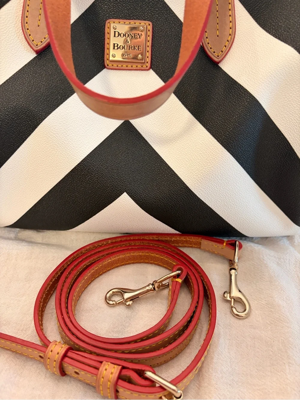 Dooney & Bourke Black and White Chevron Satchel with Red Accented Handles